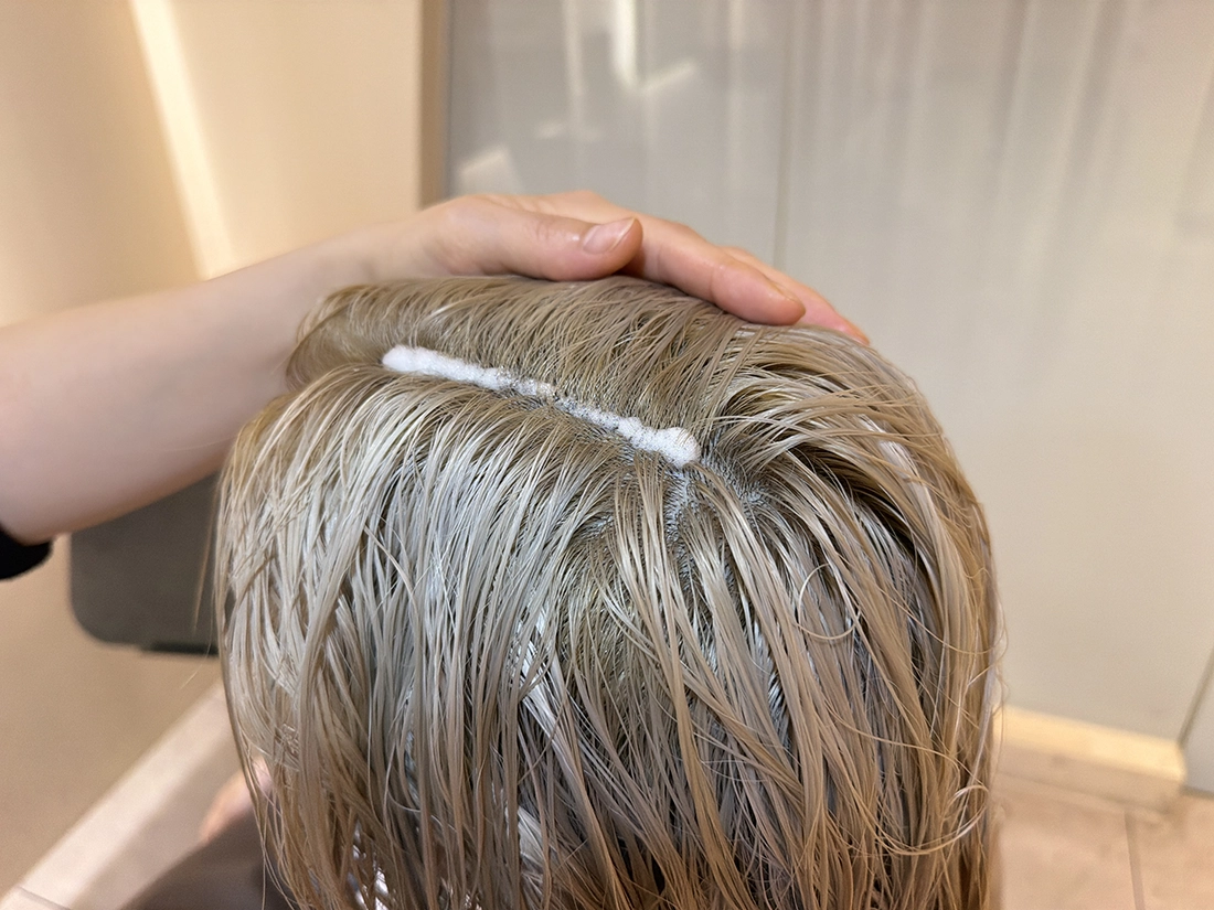 Final soothing with a scalp tonic