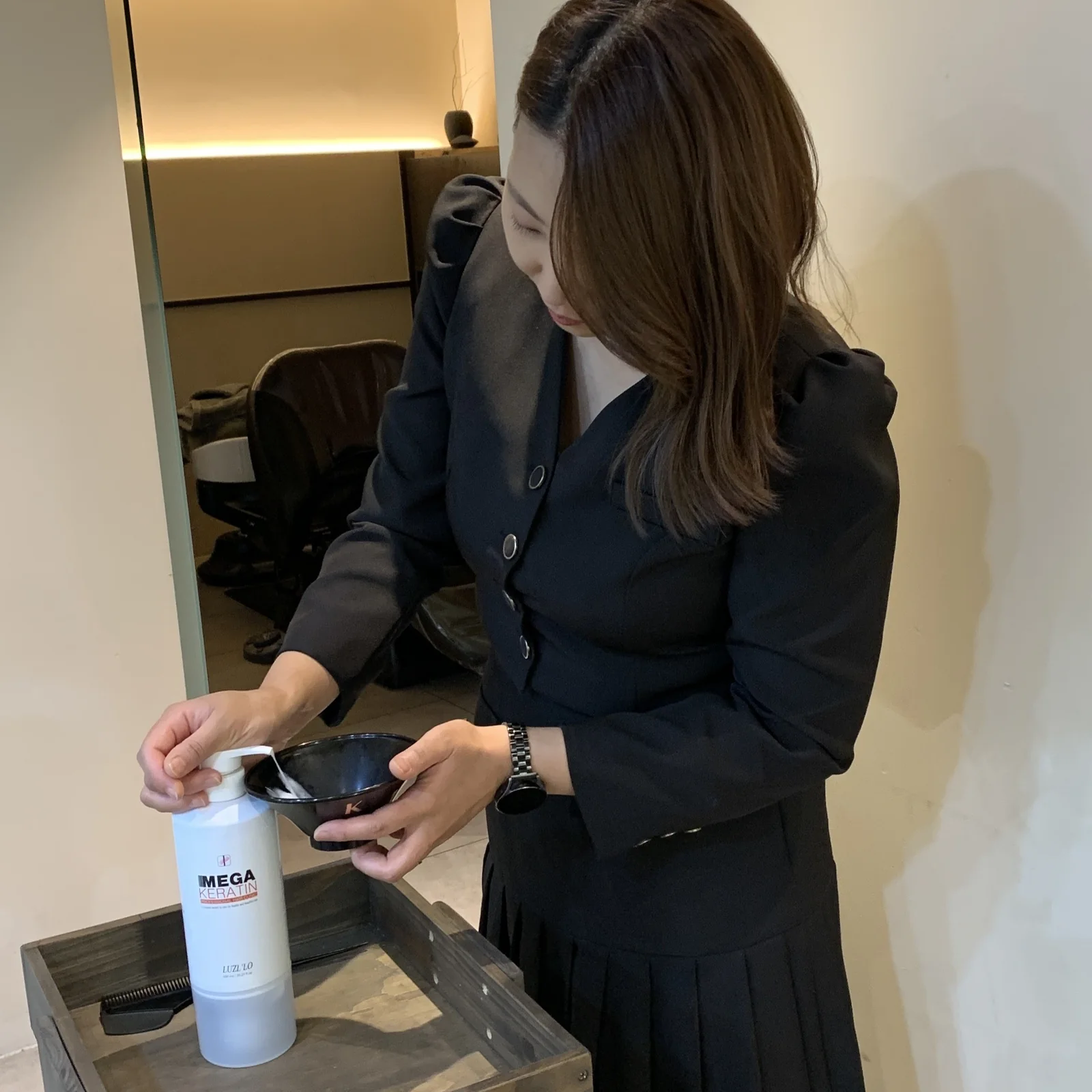 Preparing a professional keratin treatment product at a Cheongdam salon